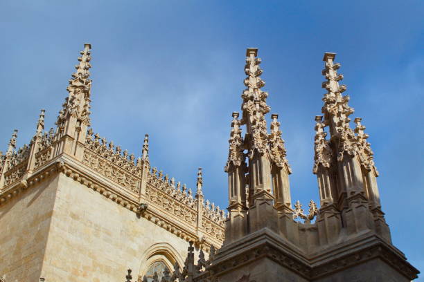 istock Stone side of Granada cathedral and pinnacles 1290727451