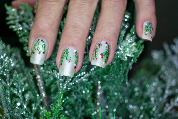 istock Mistletoe and Holly Christmas Nail Art Design 1290729475