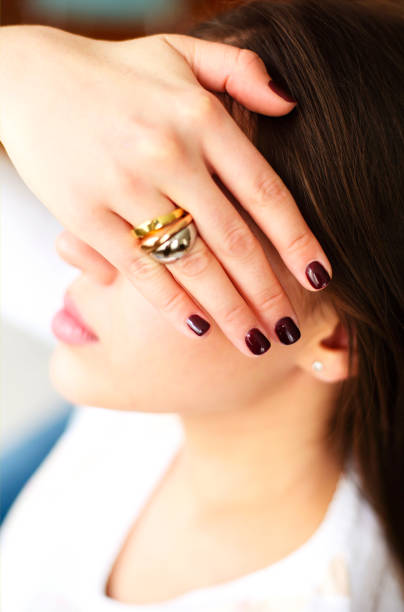 istock Cheerful young woman covering face whith hand 1290729550