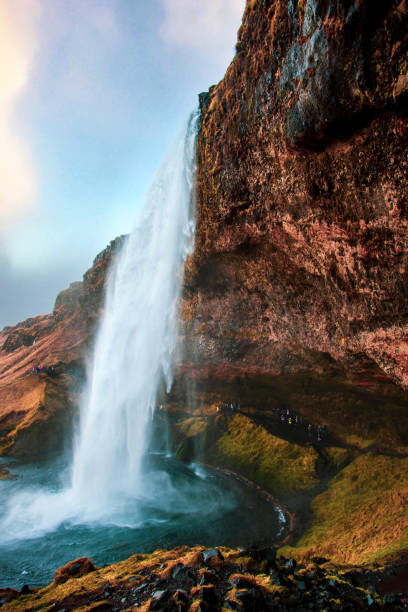 Seljalandsfoss waterfall scenic spot in Iceland famous for walk behind it and enjoying the Icelandic landscape view
