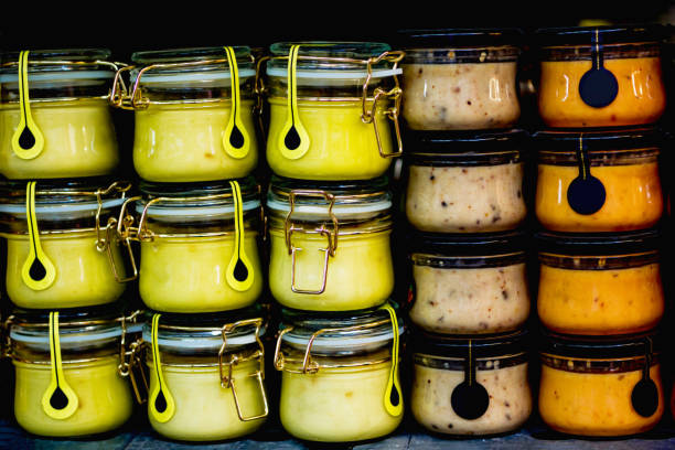 istock jars with sauces in the store 1290730610