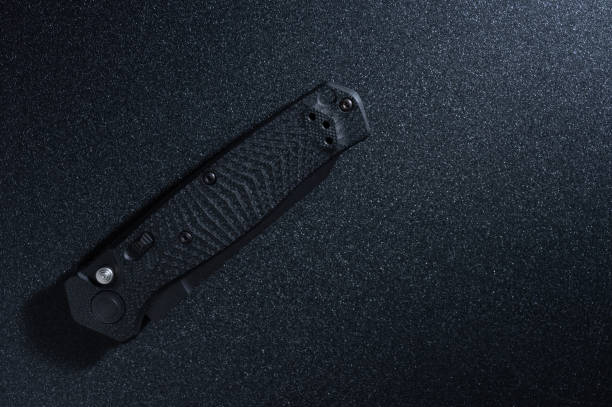 istock Pocket black knife folded. Pocket knife for daily use. Top. 1290736031