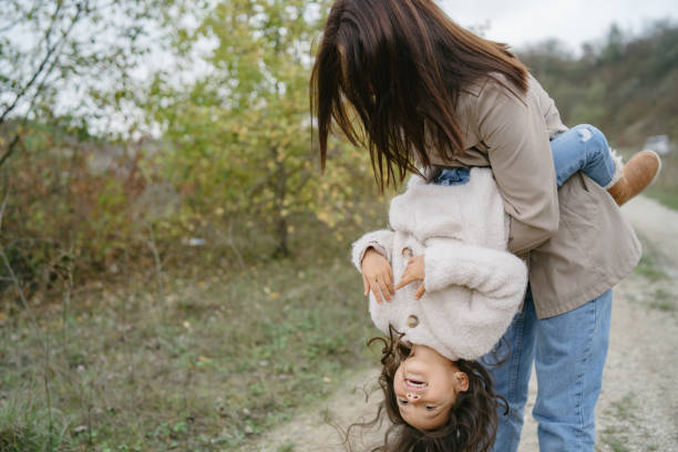 istock Mother with daughter playing in a career 1290738163