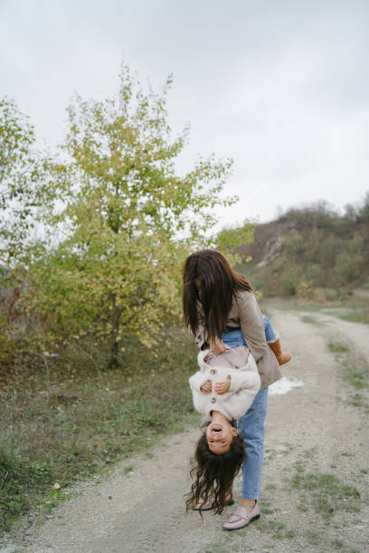 istock Mother with daughter playing in a career 1290738176