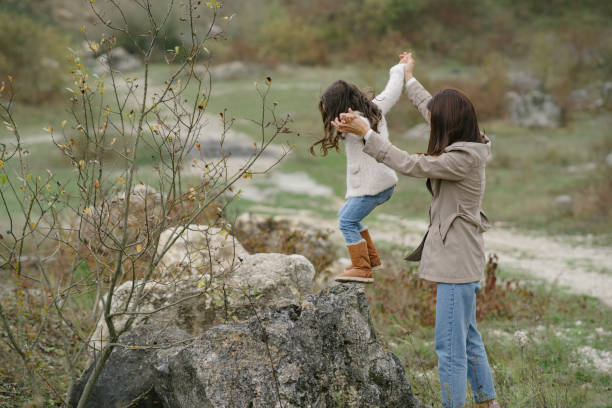 istock Mother with daughter playing in a career 1290738310