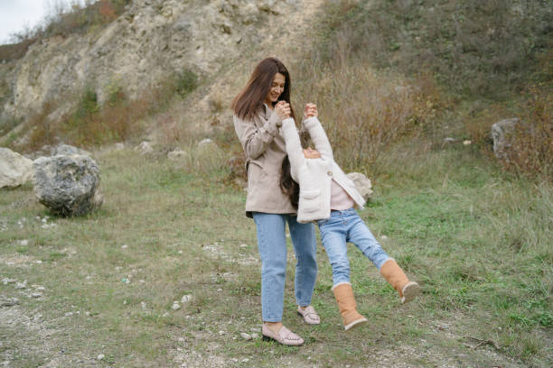 istock Mother with daughter playing in a career 1290738442