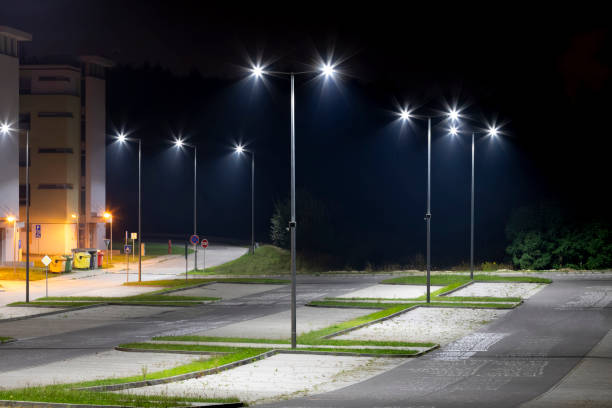 istock empty parking area with safety modern illumination at night 1290739252