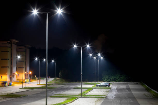 istock empty parking area with safety modern illumination at night 1290739255