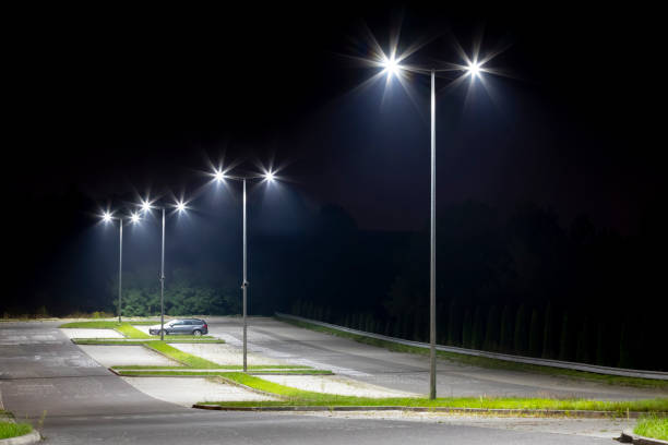 istock empty parking area with safety modern illumination at night 1290739269