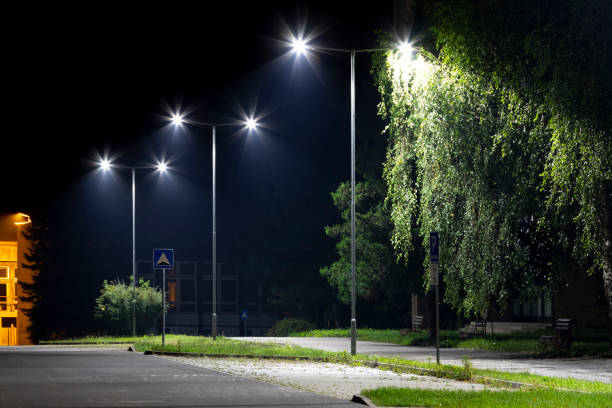 istock empty parking area with safety modern illumination at night 1290739281