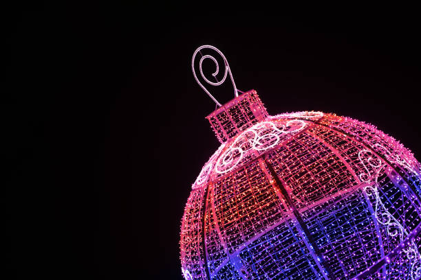 Christmas ball on black background. New year 2021 is coming.