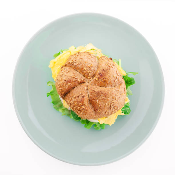 Burger on plate isolated on white background