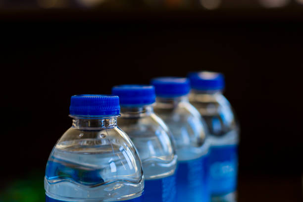 istock 4pcs water bottles with blue lid 1290740968