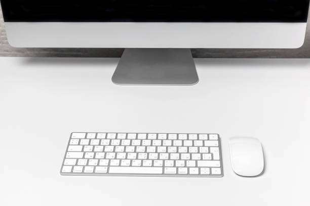 istock Desktop with a desktop computer. Online or remote work in the office and at home. Mockup workplace. 1290742462
