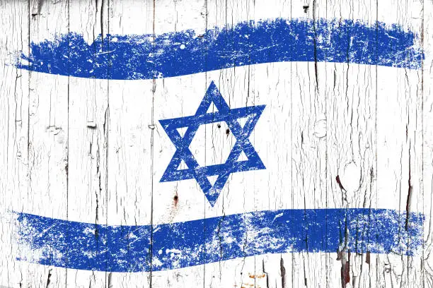 Grunge flag of Israel on old weathered white painted wooden surface background