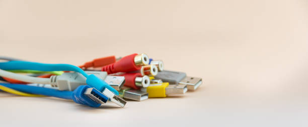 istock Colorful electrical wire and cable used in communication internet cable network and computer system on light background 1290743624