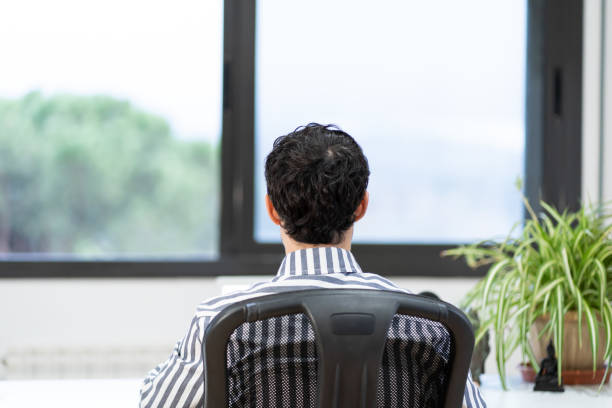 istock young entrepreneur works from home in his office with the computer in front of a window 1290743883