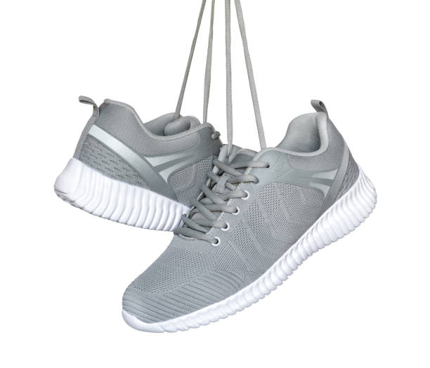 istock two Gray Sneakers isolated on white background. 1290751562