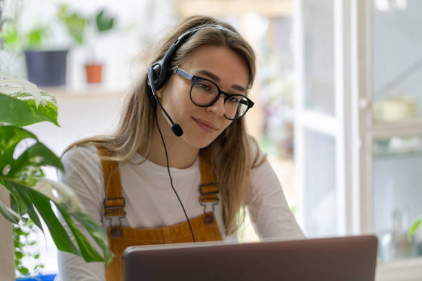 istock Smiling Woman Talking On Video Call At Shop 1290757610