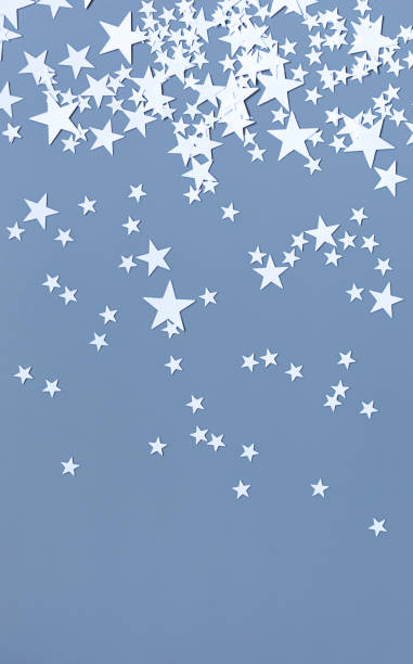 background of White decorations stars on a gray background.