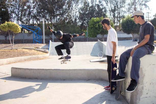 istock Friends skating in skate park 1290762802
