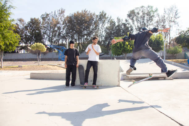 istock Friends skating in skate park 1290762807