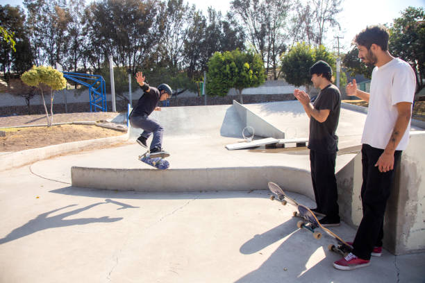 istock Friends skating in skate park 1290762838