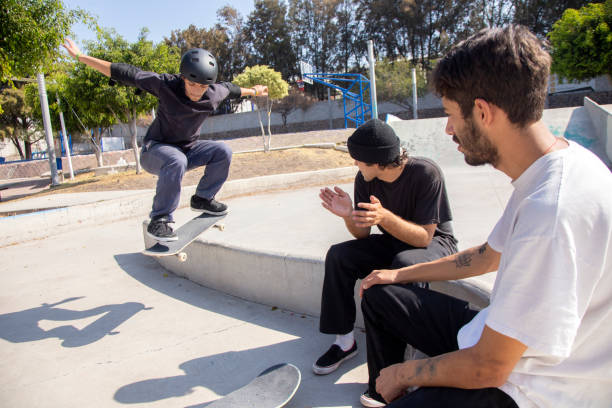 istock Friends skating in skate park 1290762844