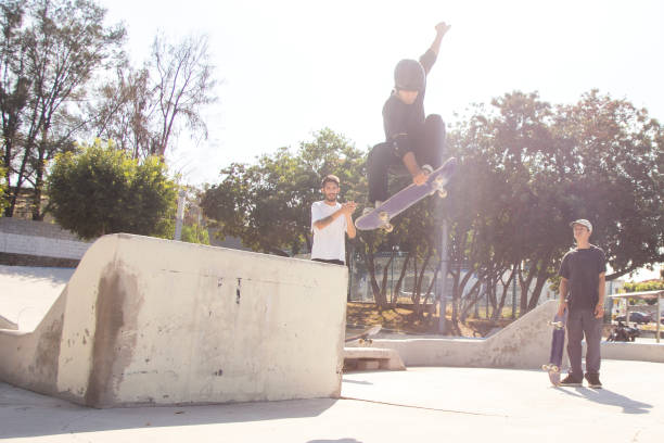 istock Friends skating in skate park 1290762872