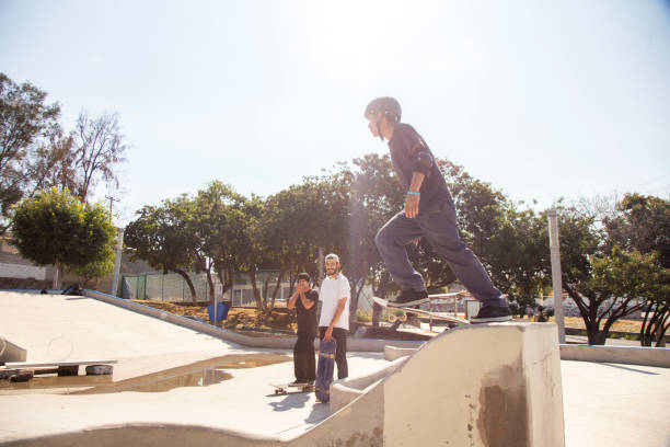 istock Friends skating in skate park 1290762915