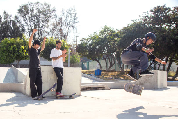 istock Friends skating in skate park 1290762916