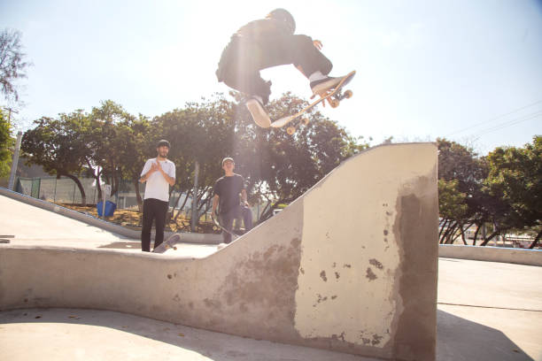 istock Friends skating in skate park 1290762952