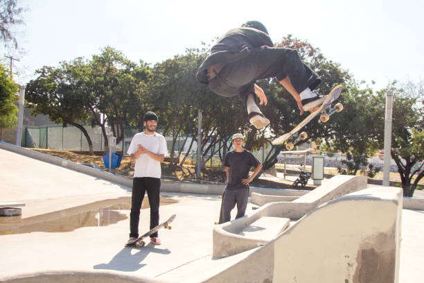 istock Friends skating in skate park 1290762959