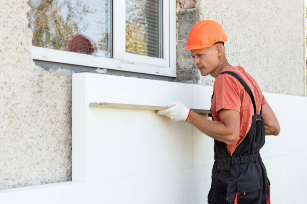 istock Insulation of the house with polyfoam. 1290764094
