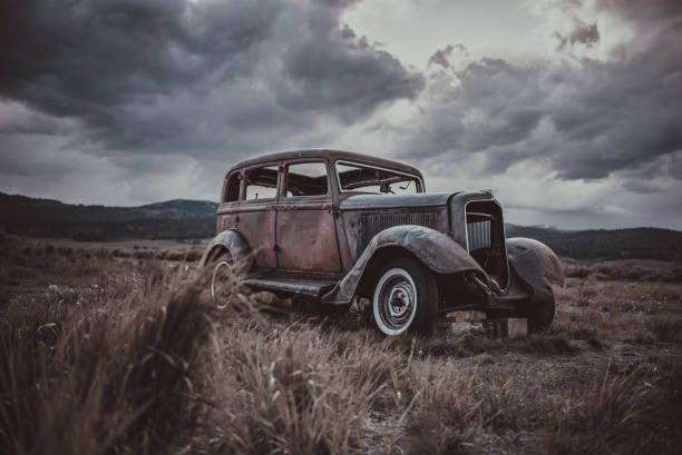 istock Vintage car in North American wilderness 1290769424