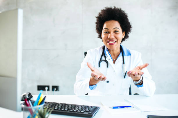 istock Portrait of a female doctor talking at camera 1290771663