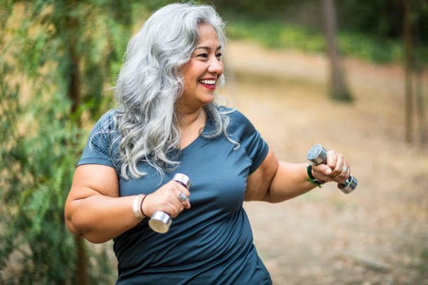 istock Senior Mexican Woman Working Out 1290775446