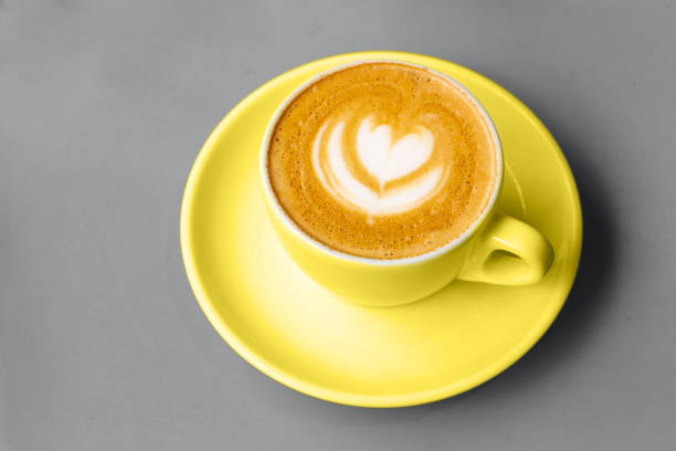 istock White cup of cappuccino with latte art. 1290783437
