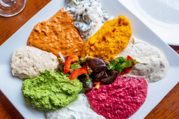 istock Close-up of various colorful Middle Eastern dips and spreads 1290792042