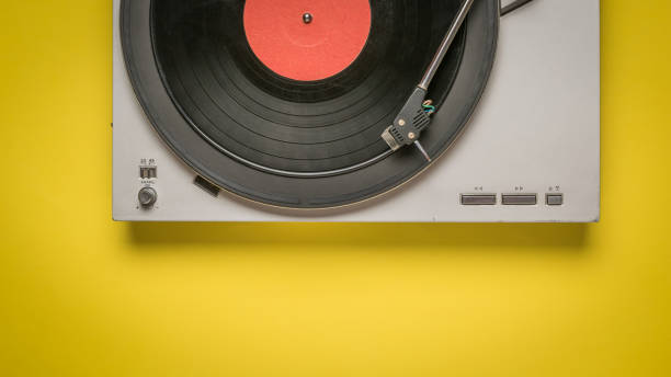 istock Top view of a vinyl record player isolated on a white background. 1290792108