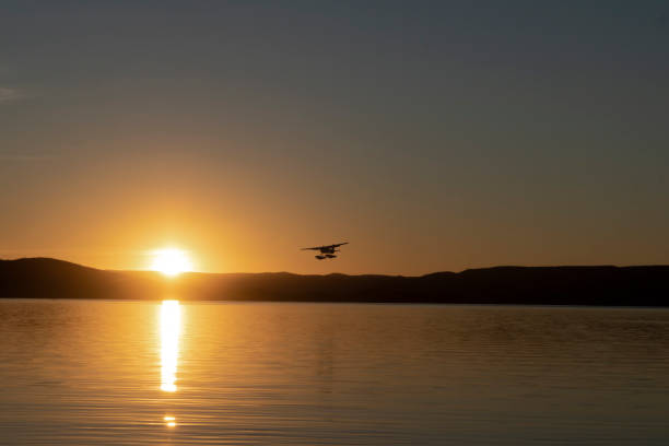 istock Airplane in the sky at Lake Argyle during sunset - 20/08/2020 1290793015