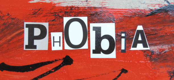 istock from cut out paper letters the word Phobia 1290795420
