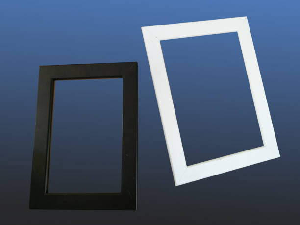 Black and white photo frames on dark blue background.
