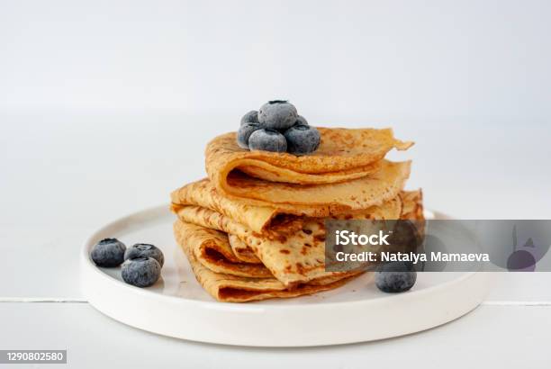 Vegan Crepes With Frozen Blueberries Stock Photo - Download Image Now - Crêpe - Pancake, Pancake, Vegan Food