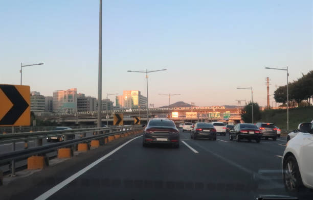 istock motor vehicles driving on the eastern Seoul highway 1290803995