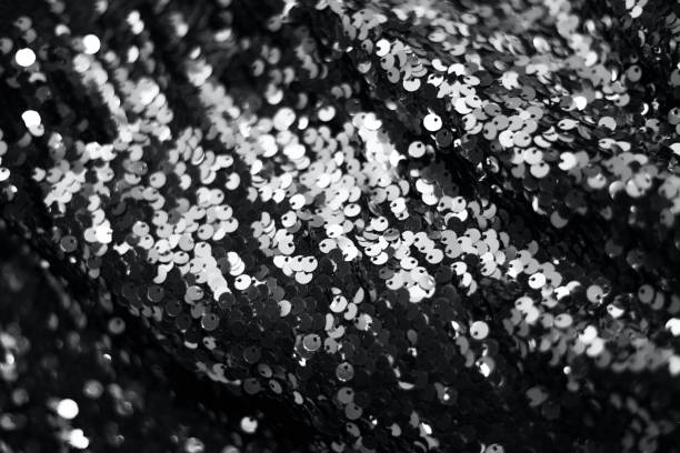 istock Festive background of trendy gray sequins. Silver universal shining background. 1290809029