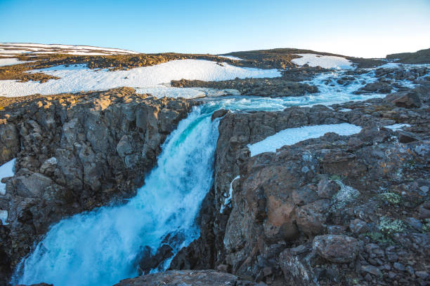 istock Waterfall on the Hikikal river, Putorana Plateau. Russia 1290809498