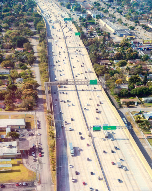 istock Highway urban traffic, Miami. Aerial view. 1290814940