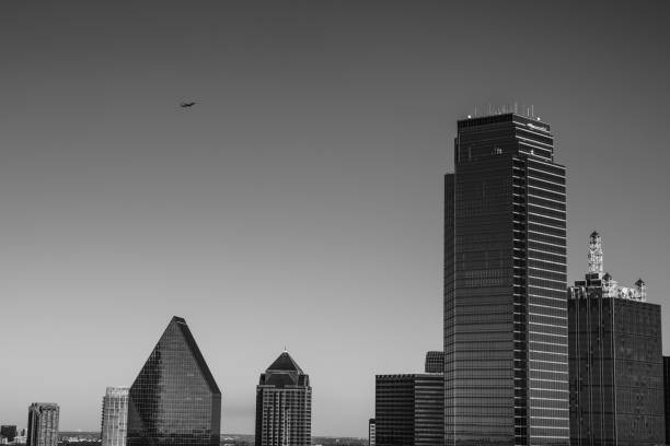 istock The plane flies over skyscrapers 1290820261