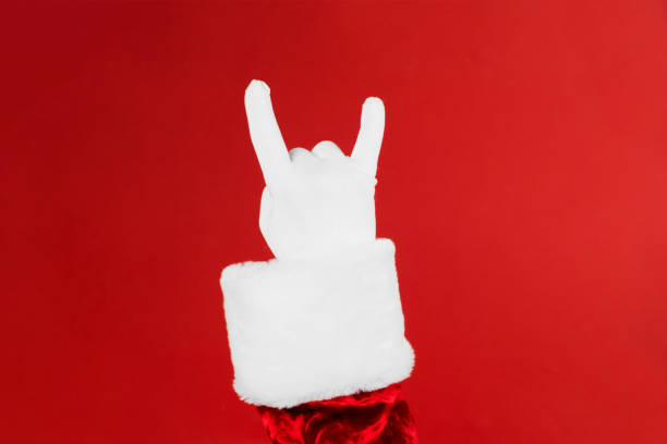 Santa Claus hand rock n roll. Christmas Rock concert poster or greeting card stock photo